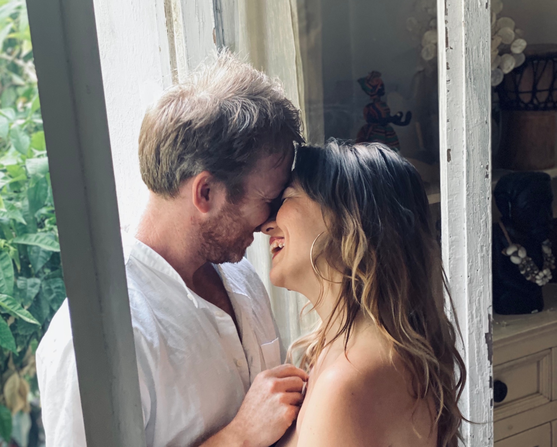 A couple sharing an easy, unhurried morning moment